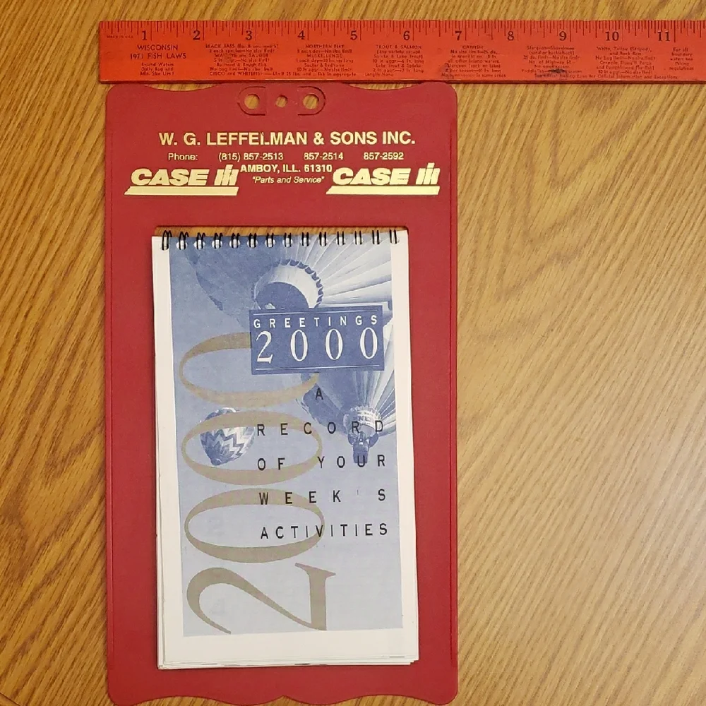 Weekly Activity Calendar with Red Clipboard